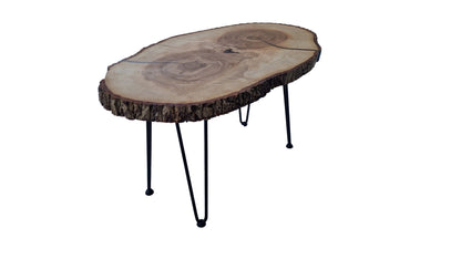 Wooden coffee table with a natural edge design on a white background